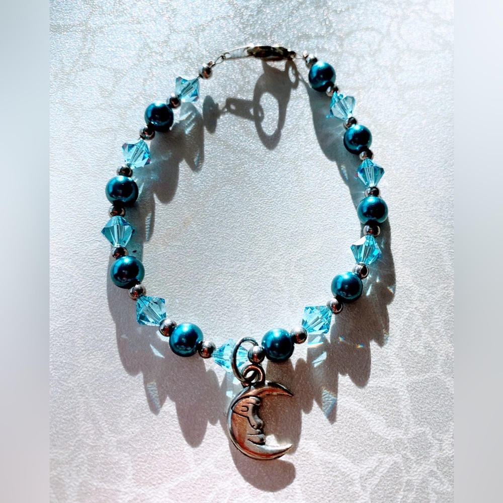Elegant Blue Beaded Bracelet with Moon Charm